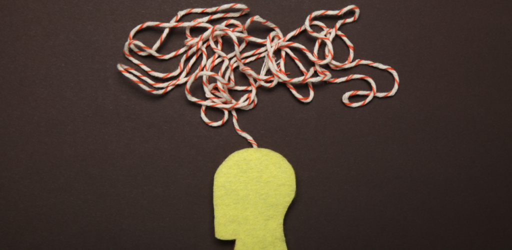 Ilustração que representa confusão mental durante uma crise, explicando como ajudar uma pessoa com crise de ansiedade